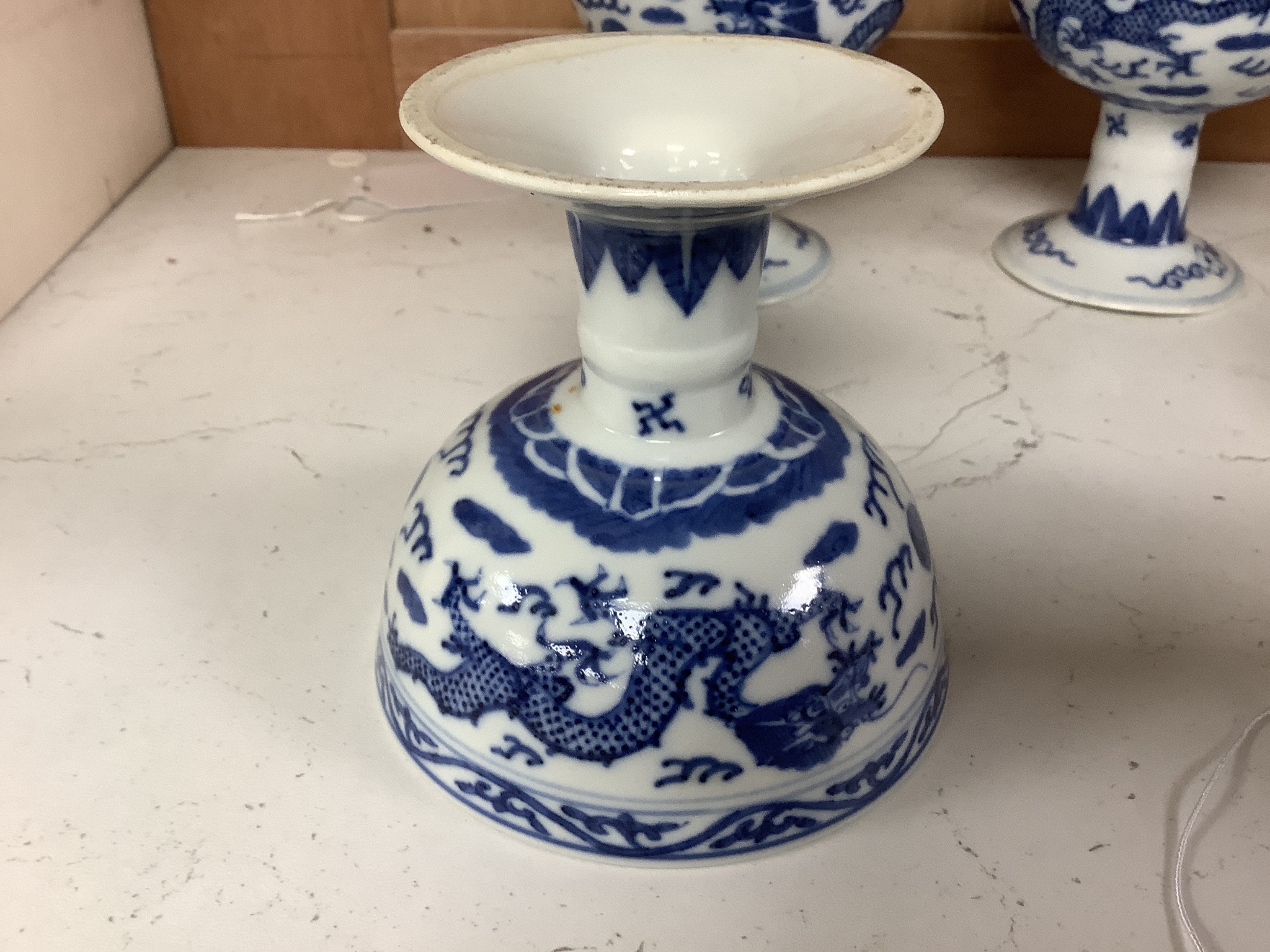 Three Chinese blue and white porcelain stem cups, c.1900, 9.5cm